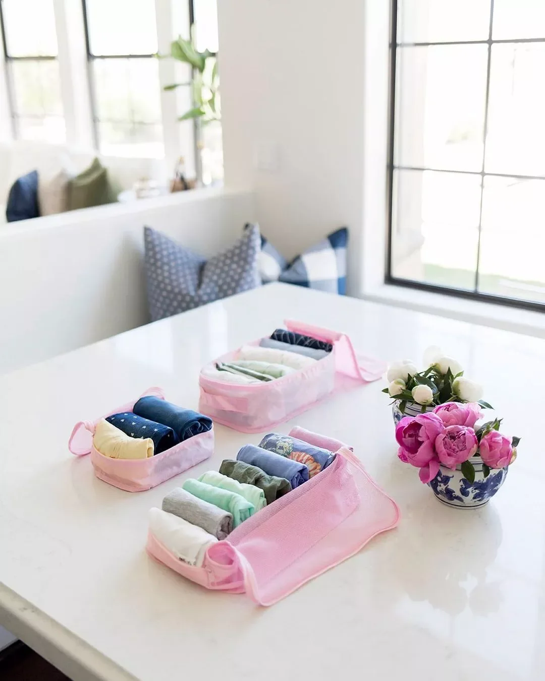32 Clever and Stylish Ways to Store Your Towels Bundle Towels in Cubes for Travel