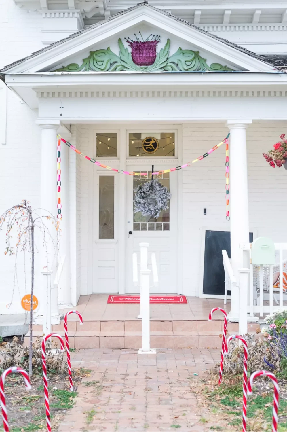 68 Christmas Front Porch Ideas That Make Your Home the Envy Candy Cane Lights