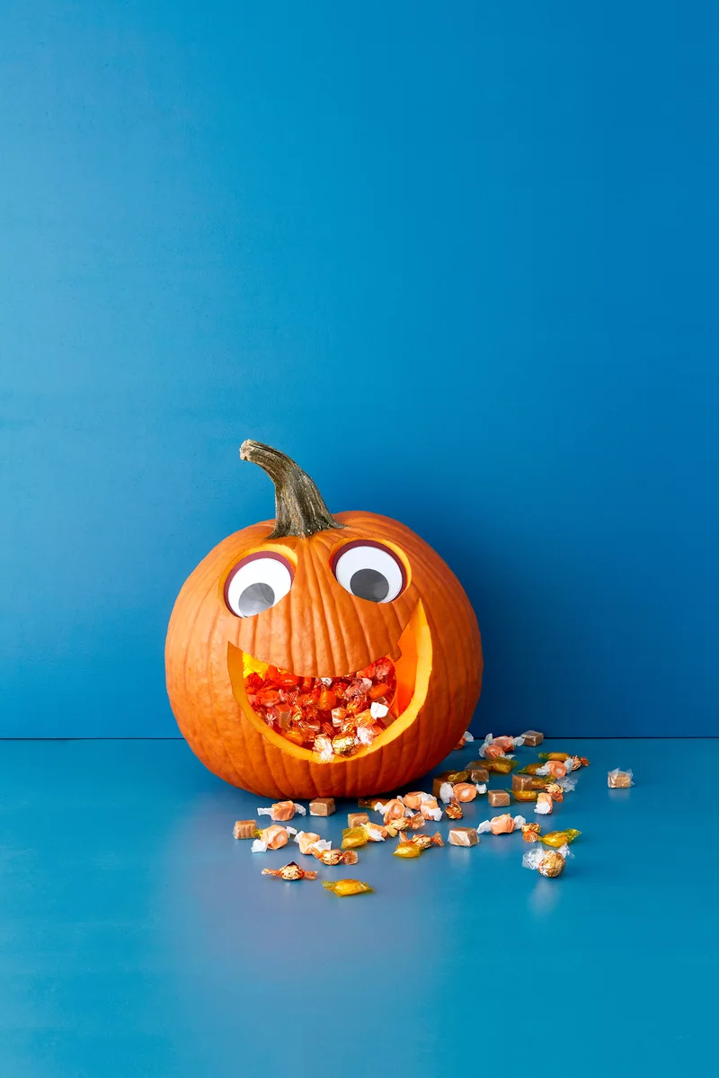 18 Fun Pumpkin-Carving Projects Perfect for Your Kids 17 Candy Monster Pumpkin Carving