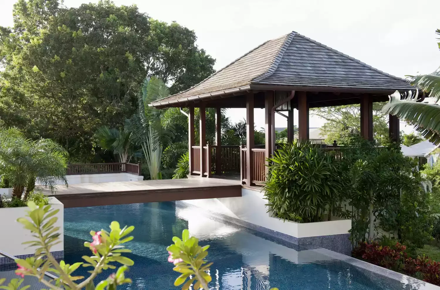 22 Stunning Pool Cabana Ideas to Transform Your Backyard Into a Luxury Resort 21 Caribbean Pool Cabana