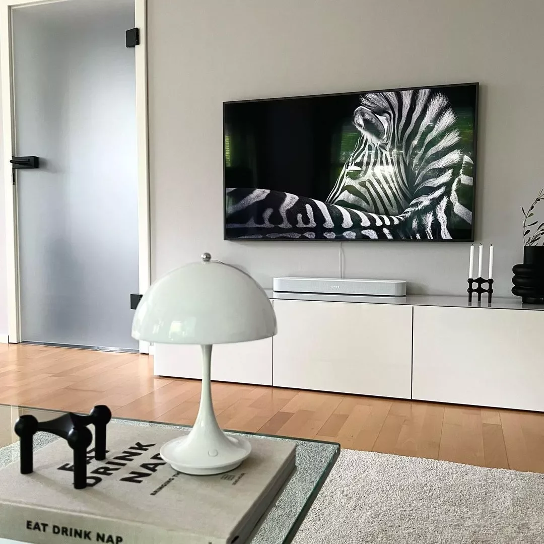 30 Stunning Black and White Living Room Ideas That Will Transform Your Space 7 Change Your TV Screensaver
