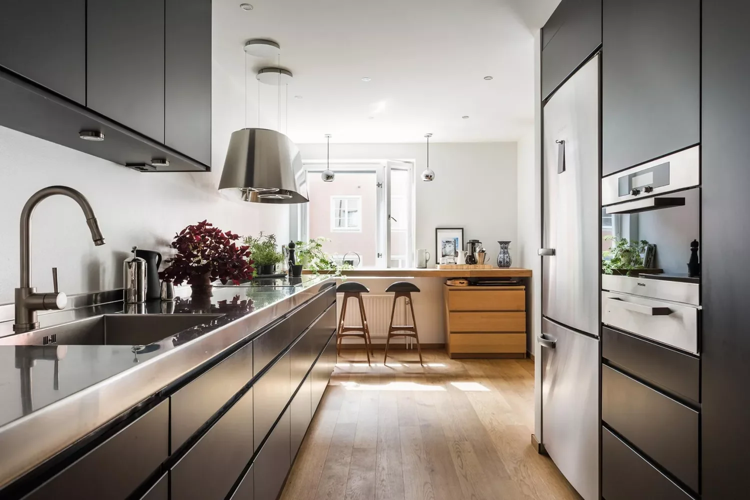 46 Galley Kitchen Design Ideas That Maximize Style and Function 32 Choose Dark Cabinetry