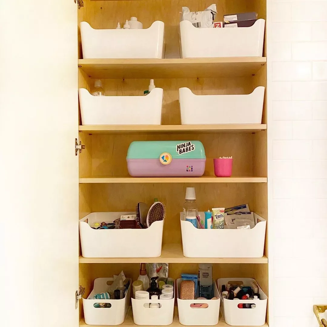 Transform Your Bathroom Closet: 23 Smart Organization Ideas That Actually Work Choose Plastic Bins for Easy Cleaning