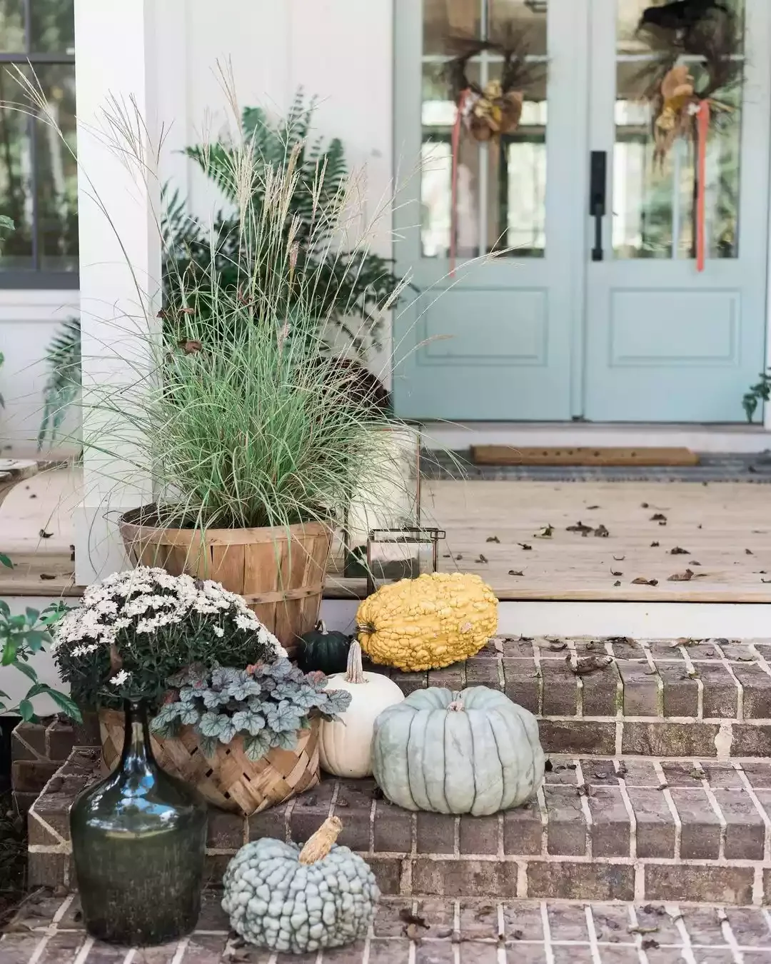 52 Autumn Front Porch Ideas That Will Transform Your Home's Entrance This Fall 52 Choose Pumpkins With Unique Textures