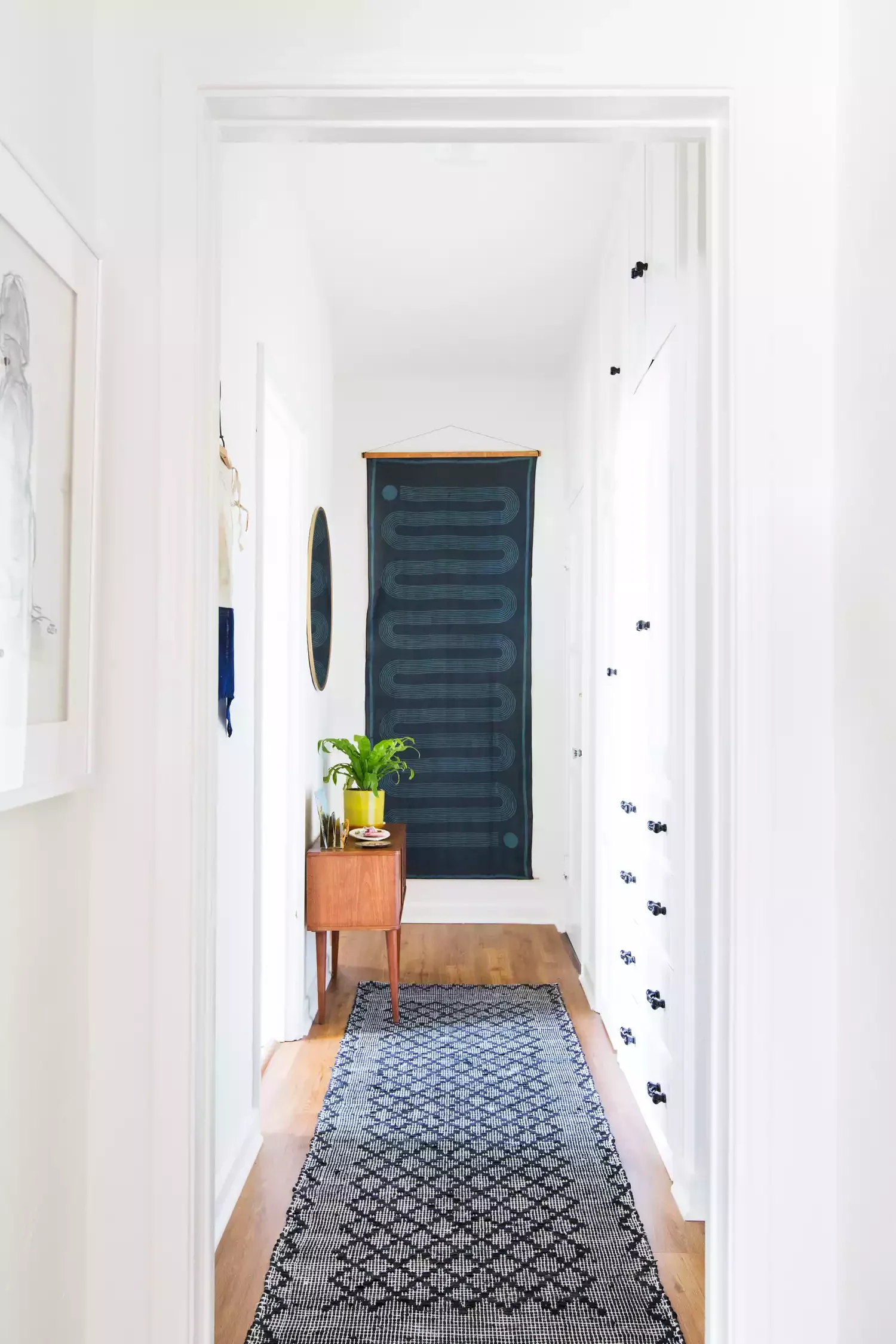 30 Smart Ways to Transform Your Narrow Hallway Into a Stylish Space 26 Choose Slim Profile Furniture