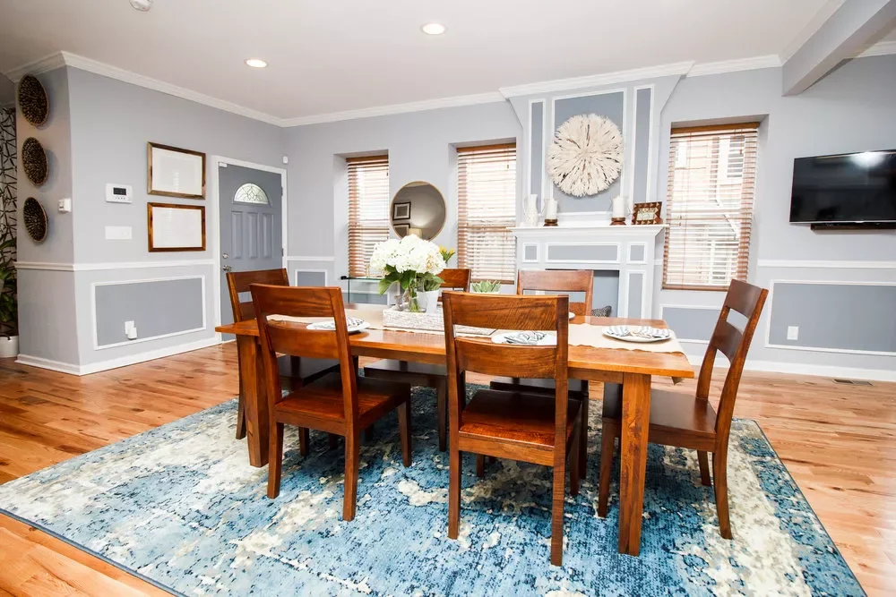 35 Beautiful Dining Room Rug Ideas That Will Transform Your Space 6 Choose a Large Abstract Rug