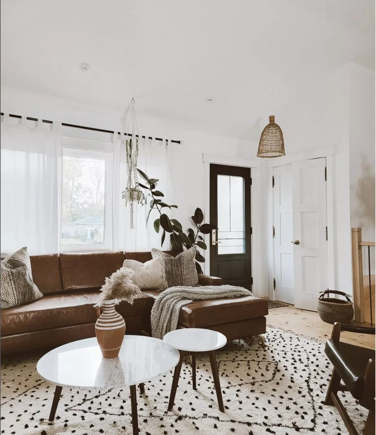 21 Cozy Scandinavian Winter Ideas That Transform Living Rooms Choose a Moroccan Rug