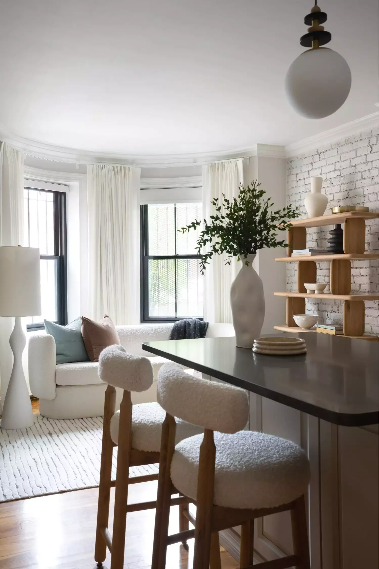 40 Smart Small Apartment Living Room Ideas That Maximize Your Space and Style 8 Choose a Rounded Sofa