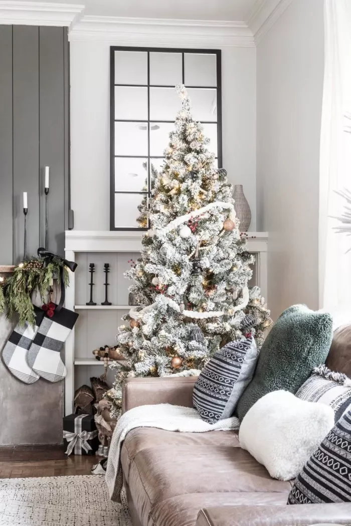 27 Stunning Flocked Christmas Tree Ideas That Transform Your Holiday Decor 25 Choose a Rustic Theme