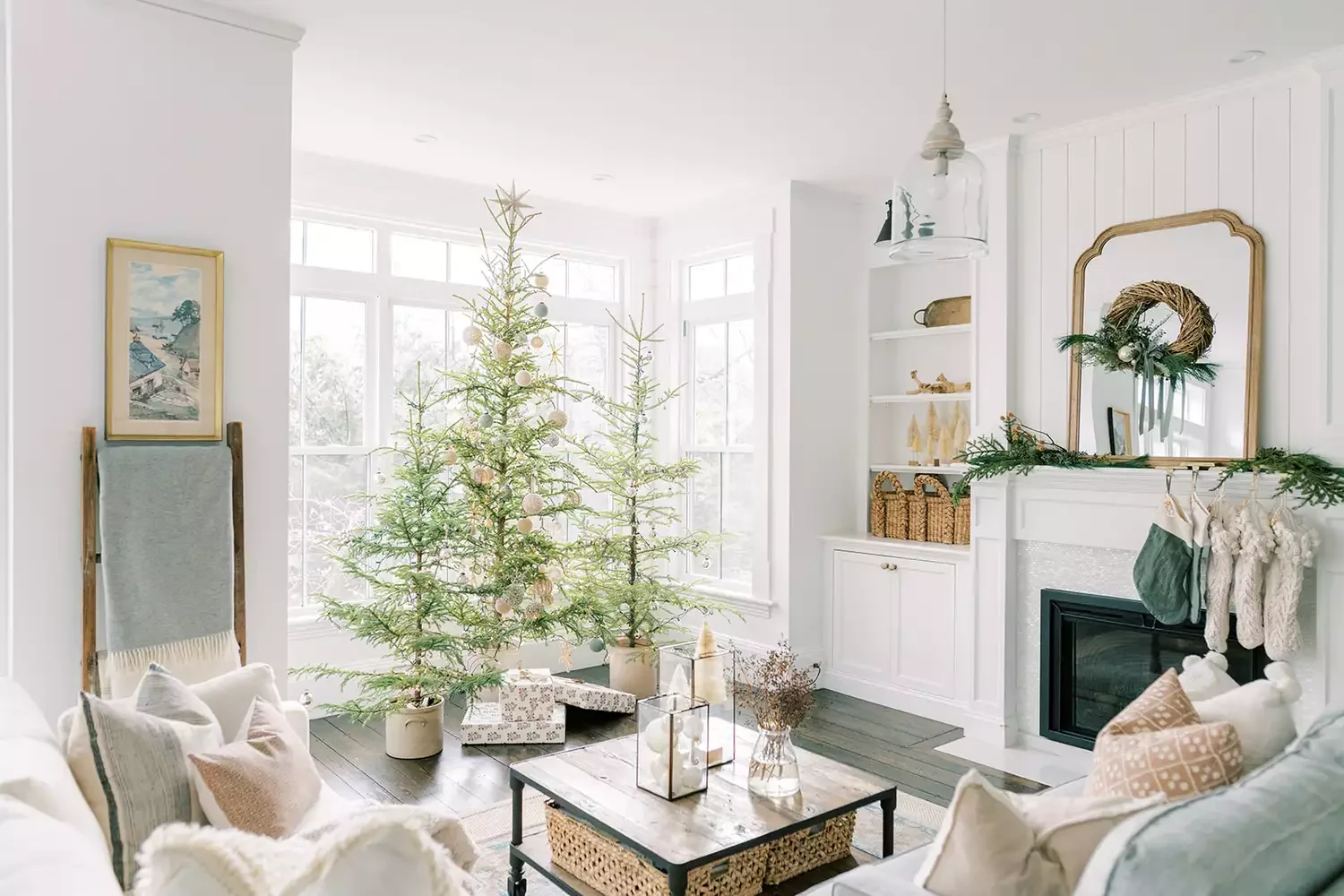 50 Christmas Decorating Ideas That Create a Designer Wonderland Cluster Multiple Trees