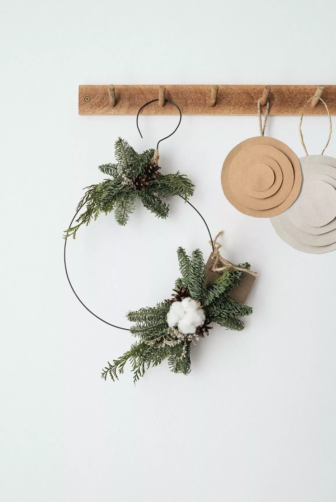 75 Stunning DIY Holiday Wreath Ideas to Transform Every Space in Your Home 45 Coat Hanger Wreath