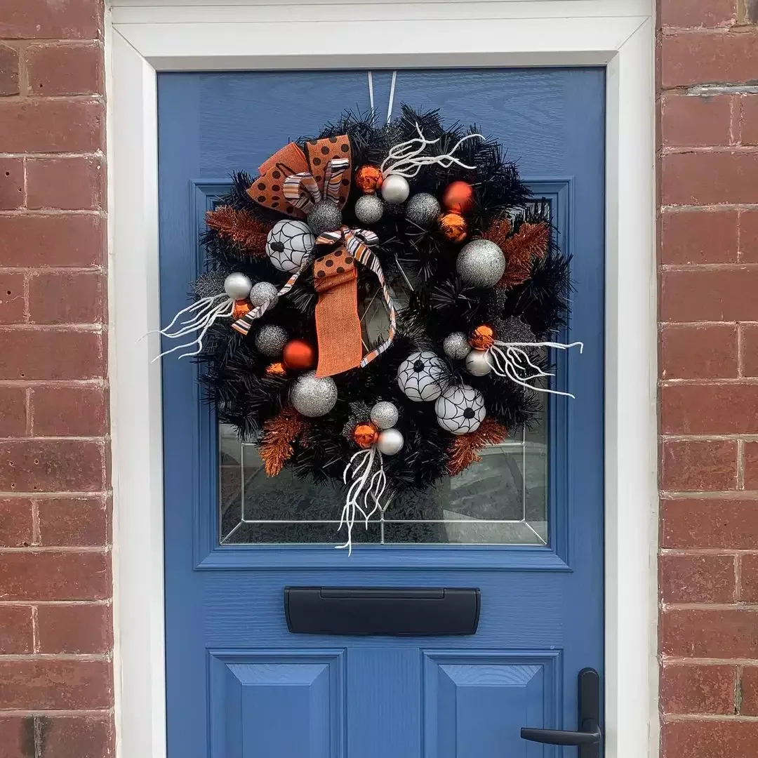 45 Spooktacular Halloween Wreath Ideas That Will Make Your Front Door the Neighborhood's Favorite Stop 31 Cobweb Halloween Wreath