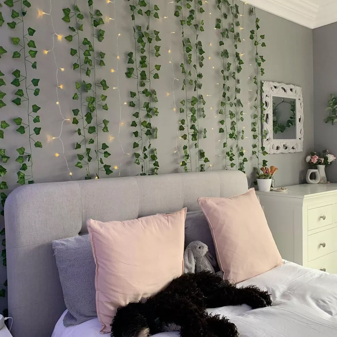37 Beautiful Aesthetic Bedroom Ideas to Transform Your Space 28 Combine Vines and White Lights