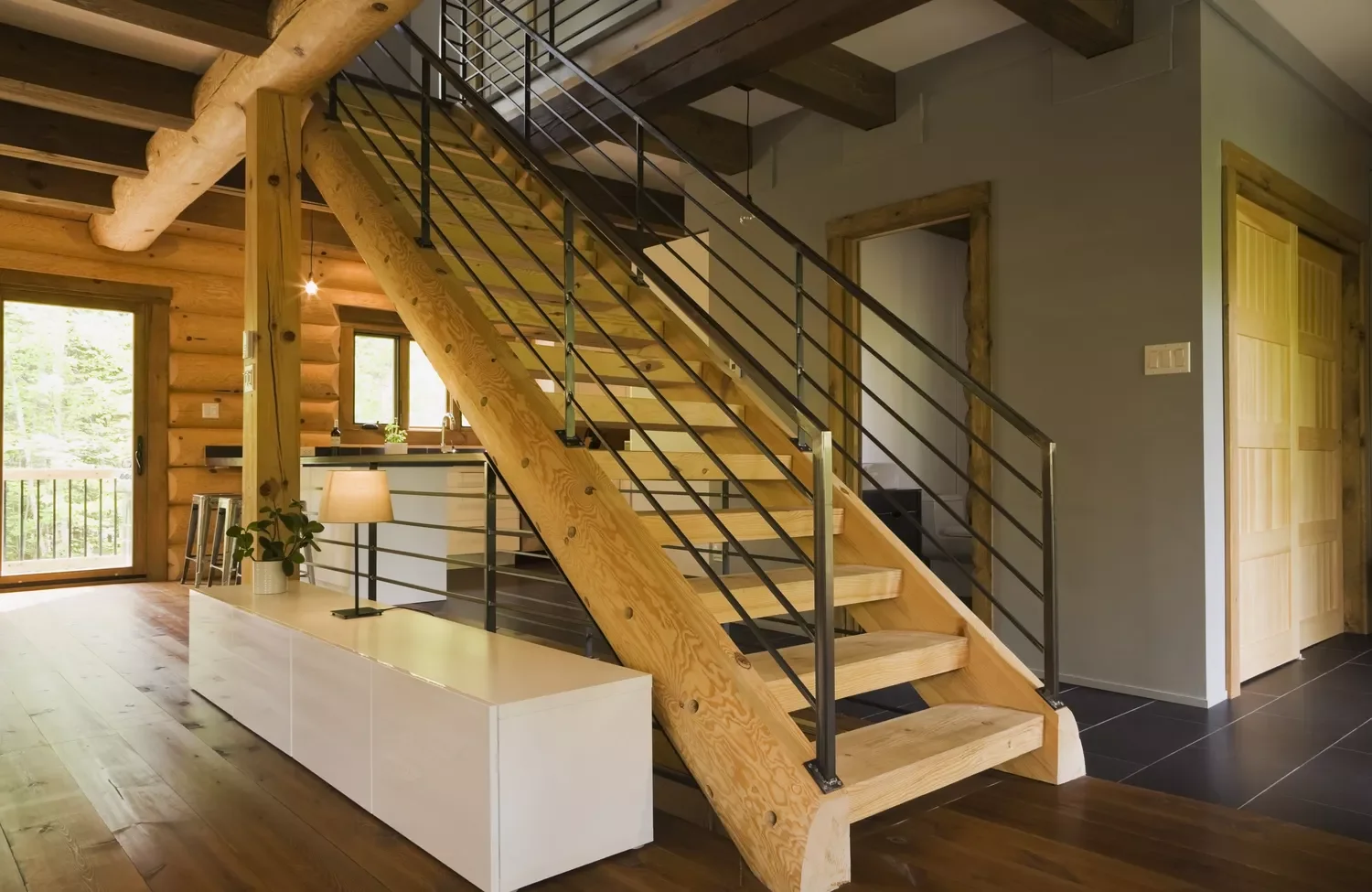 22 Fresh Ways to Give Your Log Cabin a Modern Makeover 2 Commission a Custom Stair Rail