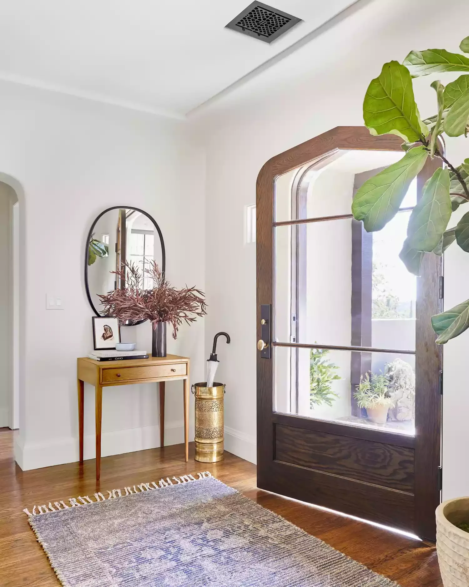 22 Stunning Entryway Wall Ideas That Create an Amazing First Impression 14 Complement the Door