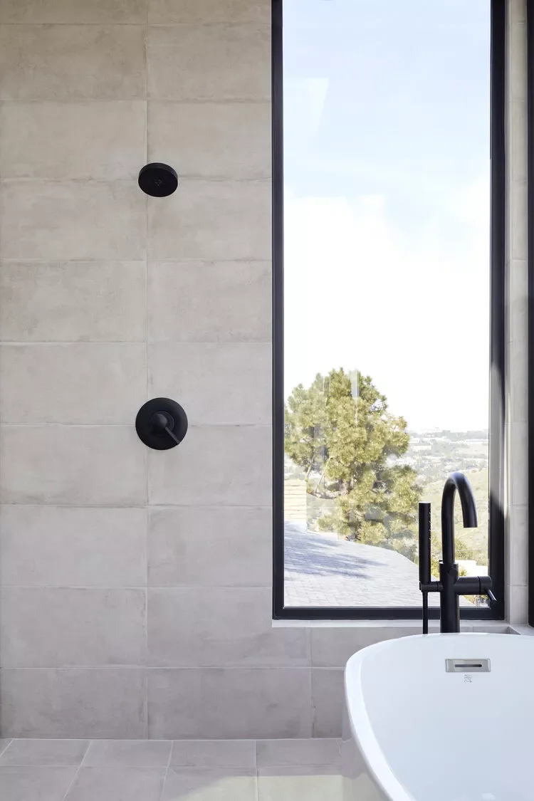 30 Stunning Walk-In Shower Tile Ideas to Transform Your Bathroom 23 Concrete-Effect Tile