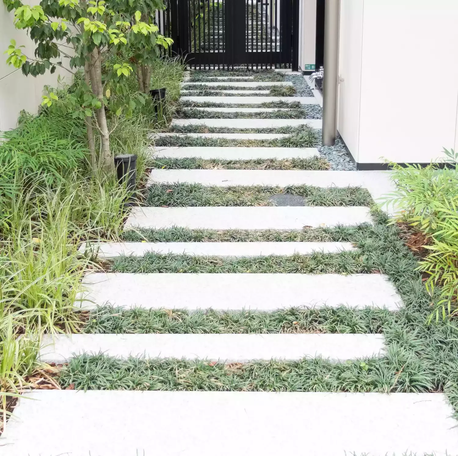 10 Stunning Concrete Paver Walkway Ideas That Transform Your Home's Curb Appeal Concrete Pavers Across a Lawn