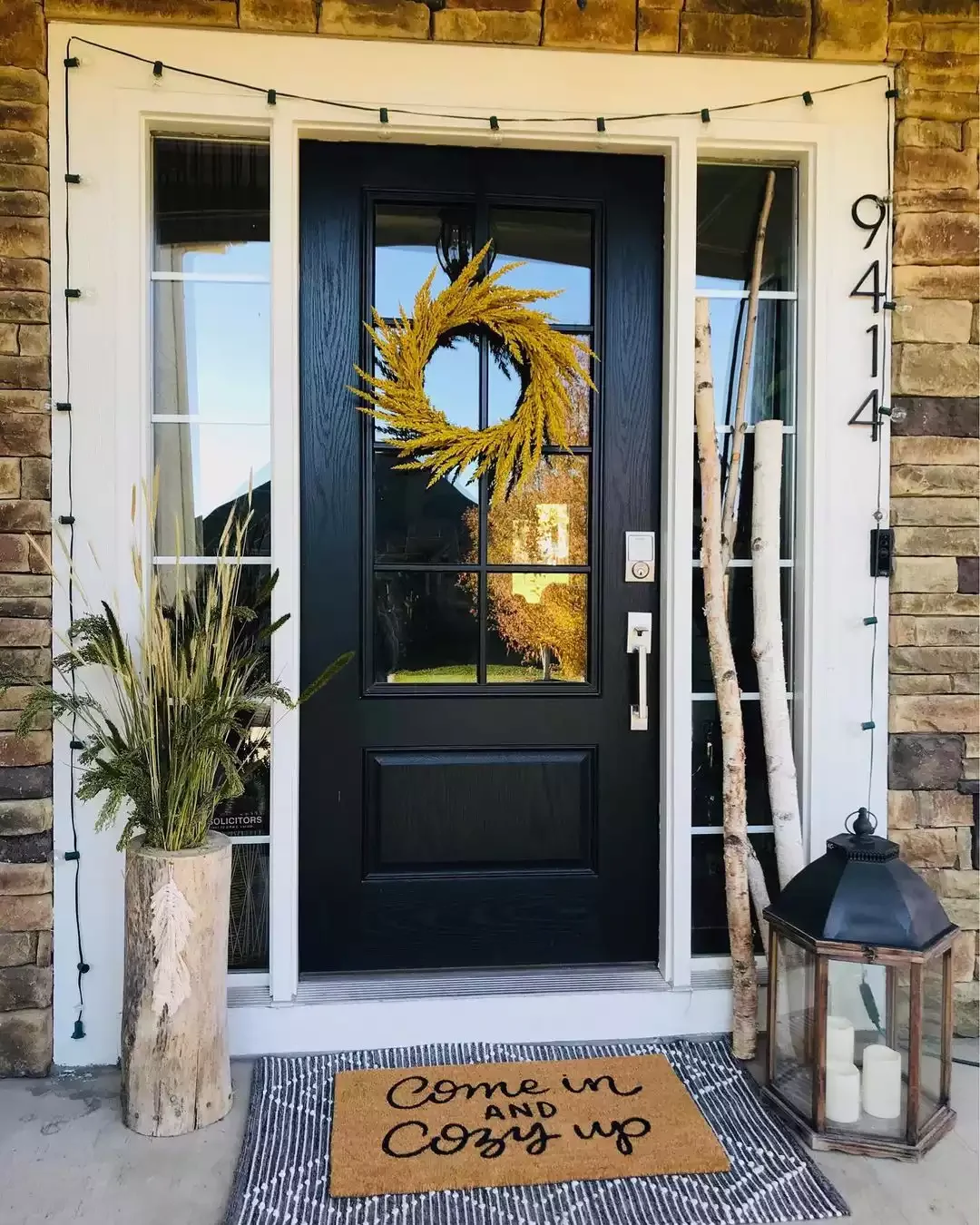 33 Stunning Black Front Door Ideas That Transform Your Home's Entrance Consider Pairing Black and Stone