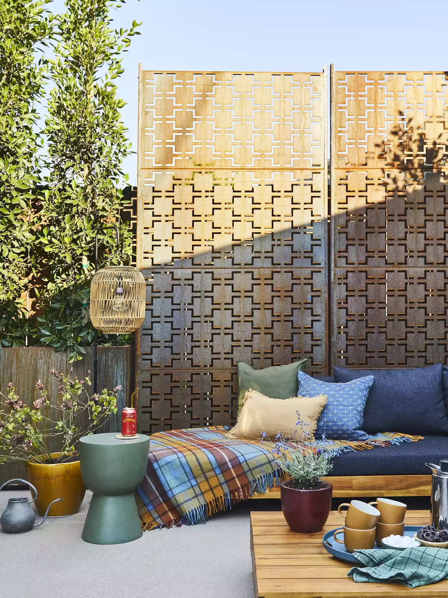 12 Brilliant Ways to Hide Your Trash Cans and Beautify Your Home Consider a Decorative Screen Panel