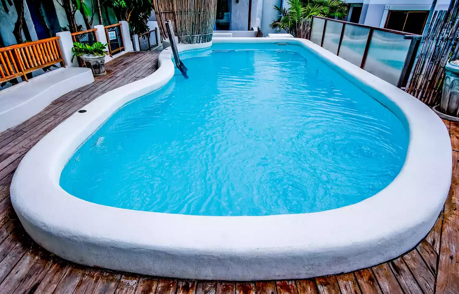 37 Brilliant Above-Ground Pool Deck Ideas That Won't Break Your Budget 35 Contrast Concrete With Wood