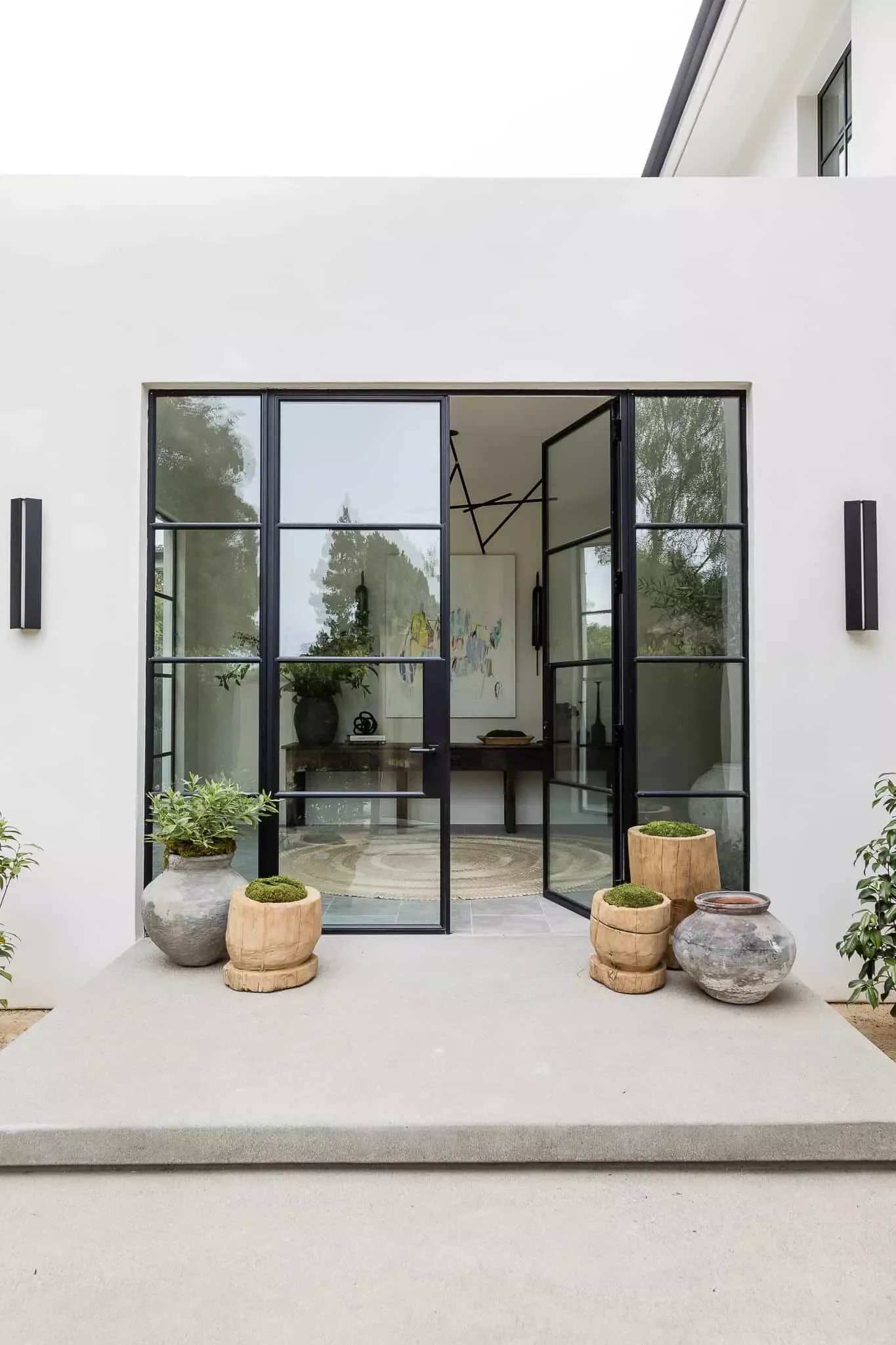 47 Stunning Modern Front Porch Ideas That Will Transform Your Home's Curb Appeal 31 Contrast Metal and Glass