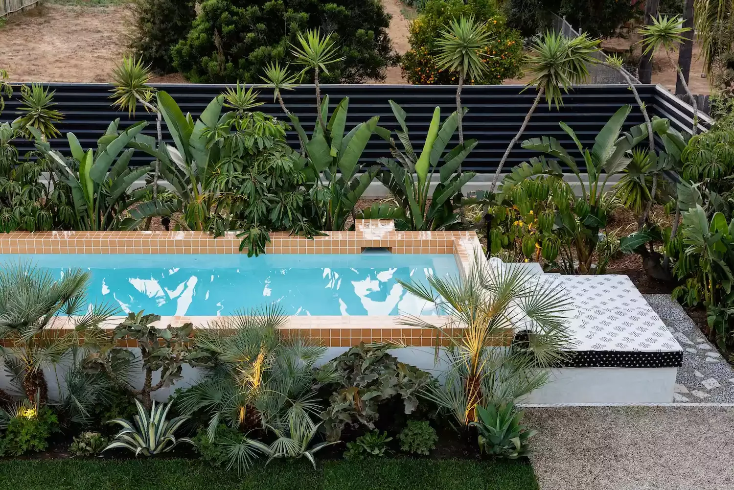 20 Stunning Pool Tile Ideas to Transform Your Swimming Area 7 Contrasting Tile Border