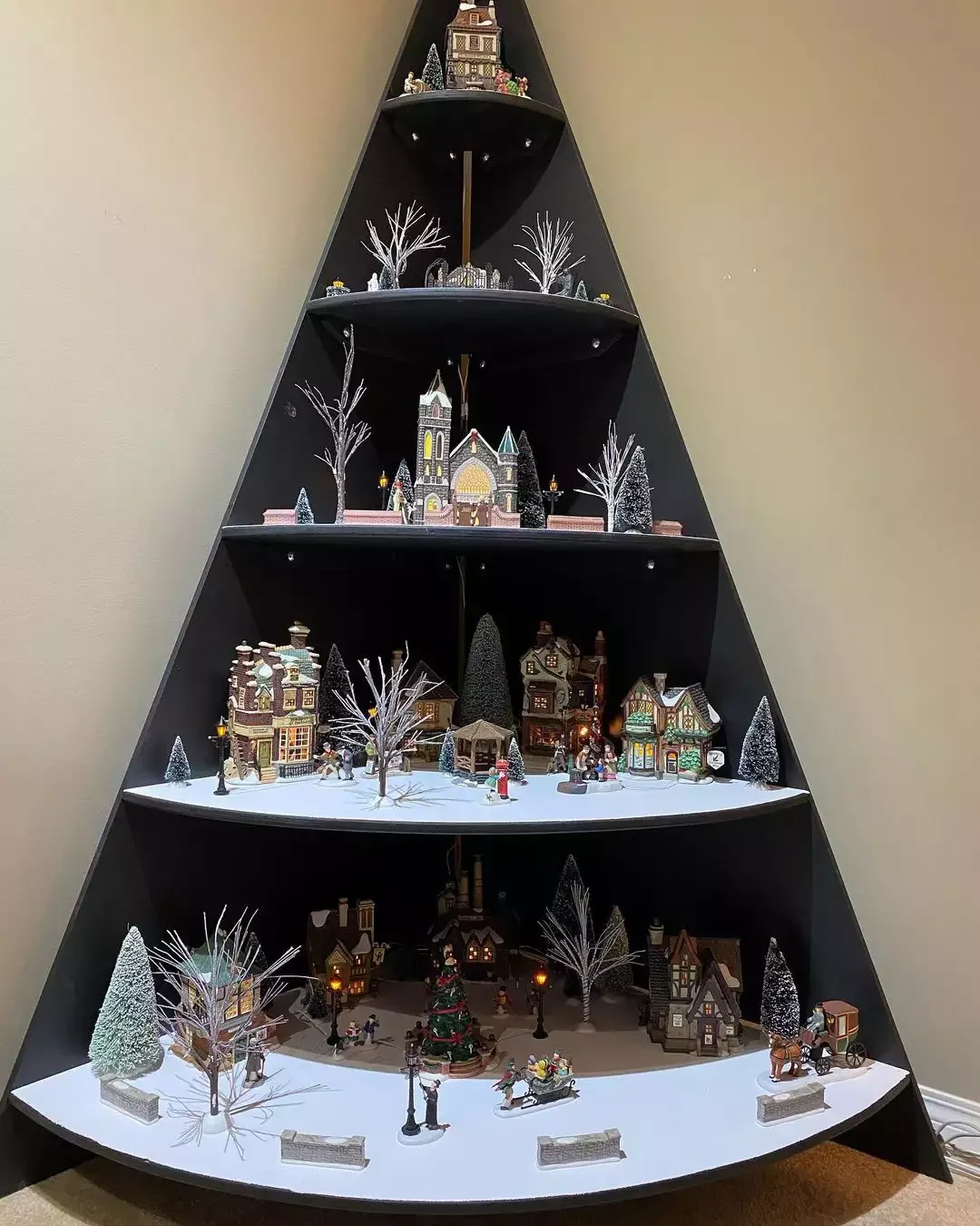 20 Magical Christmas Village Display Ideas That Will Transform Your Home Into a Winter Wonderland 5 Corner Display