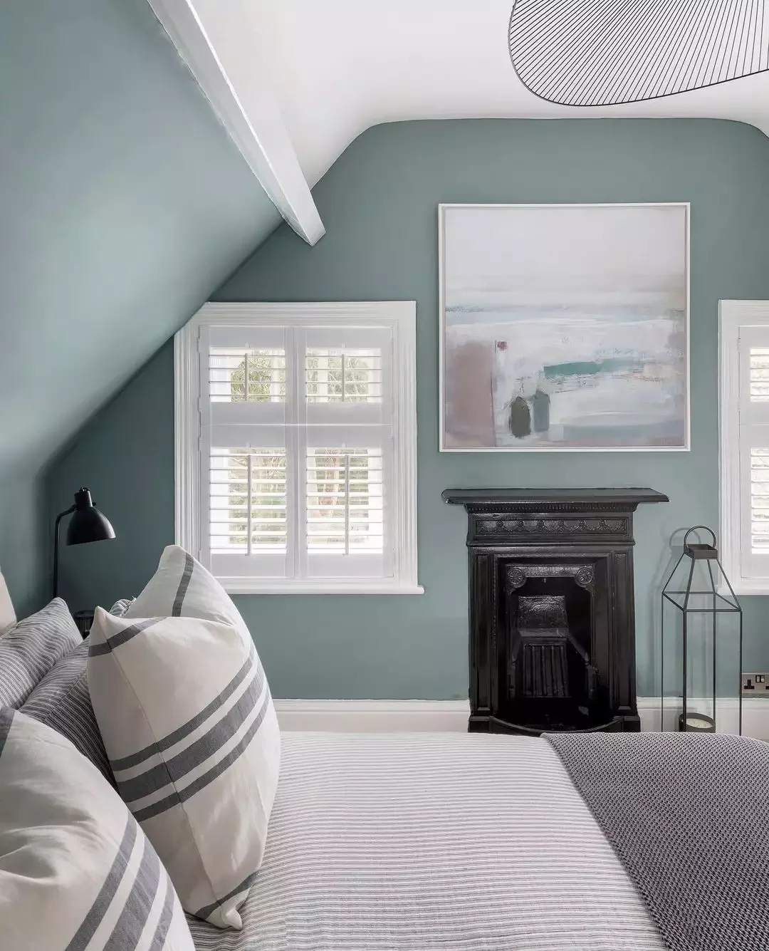 30 Brilliant Ways to Transform Your Small Attic Space With Low Ceilings 2 Cozy It Up With a Fireplace