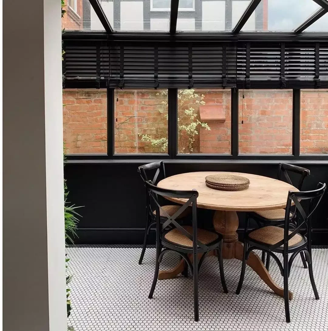 40 Stunning Black Dining Room Ideas to Transform Your Space 19 Create Contrast With White Flooring