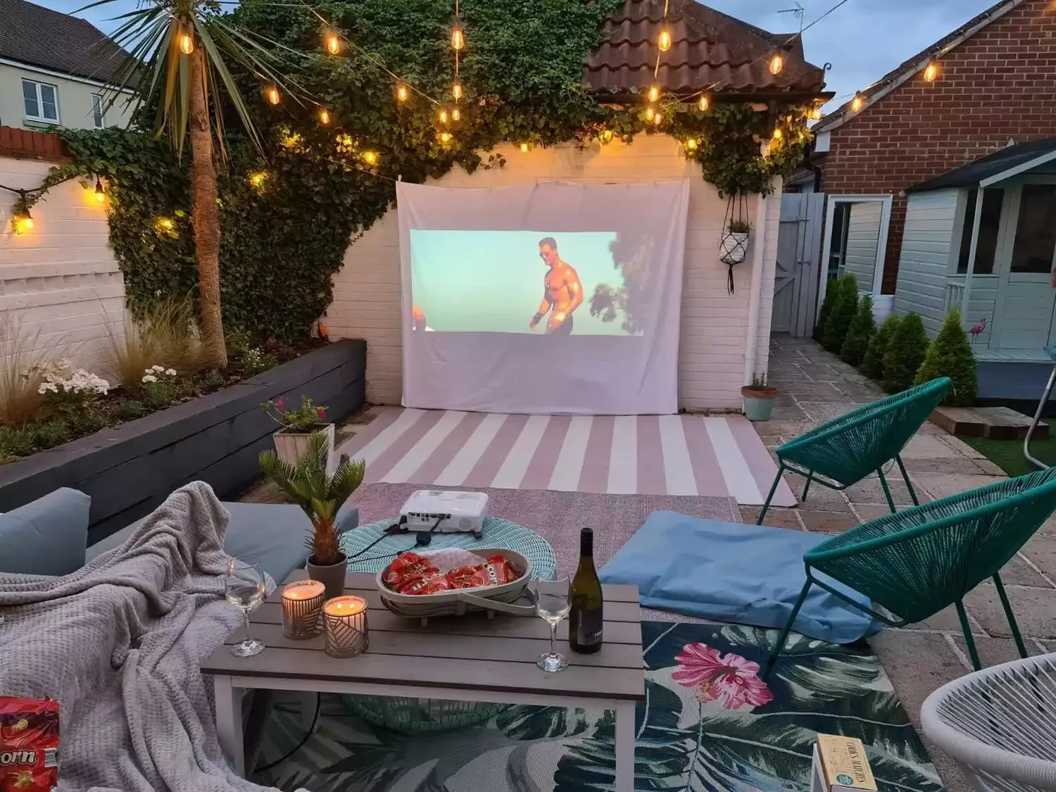 43 Budget-Friendly Backyard Makeover Ideas That Look Expensive 13 Create a Backyard Movie Theater