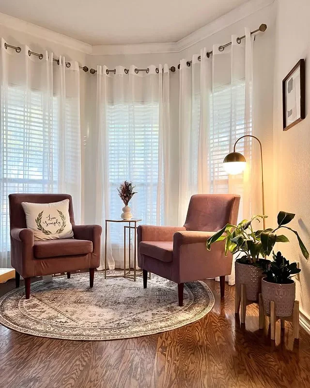 21 Stunning Bay Window Ideas That Will Transform Your Living Room 3 Create a Conversation Nook
