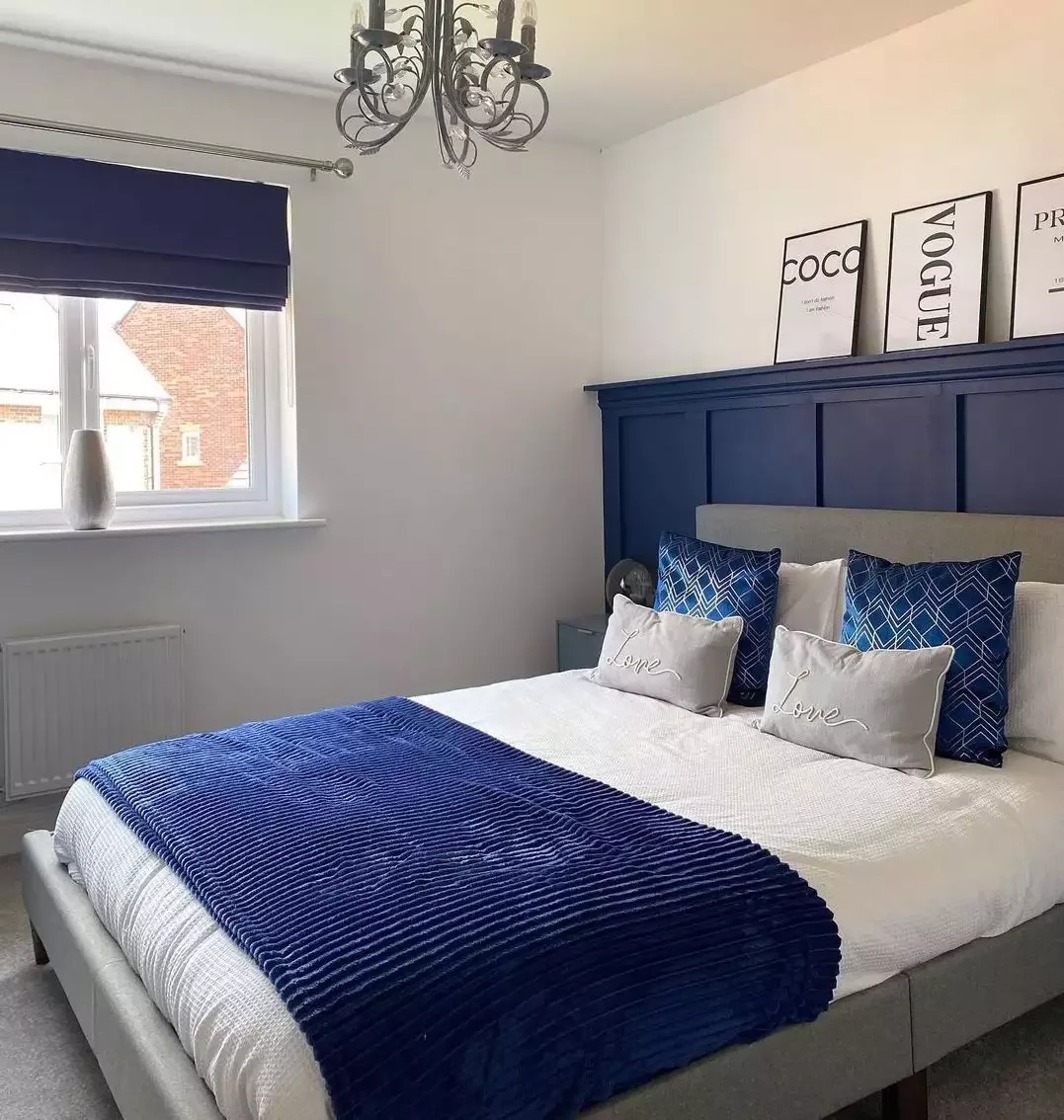 25 Stunning Navy Blue Bedroom Ideas That Will Transform Your Space 7 Create a Headboard Accent Wall