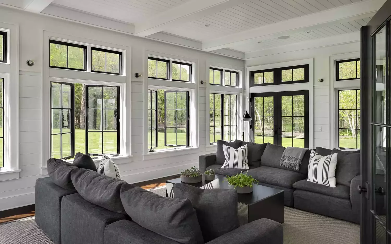 50 Stunning Sunroom Ideas That Transform Your Home Into a Light-Filled Paradise 21 Create a Lounge Space
