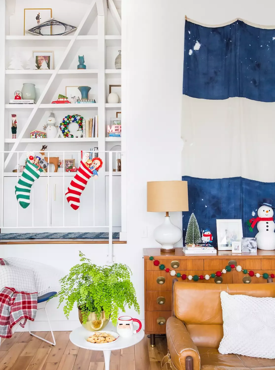50 Christmas Decorating Ideas That Create a Designer Wonderland Create a Makeshift Mantel