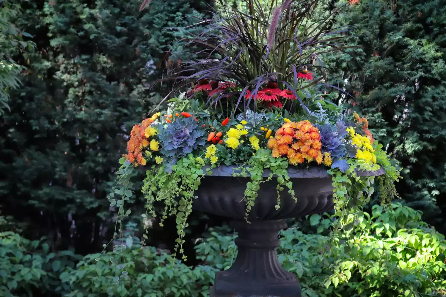 30 Stunning Fall Decor Ideas to Transform Your Outdoor Space Into an Autumn Paradise 1 Create a Planter With Moody Hues