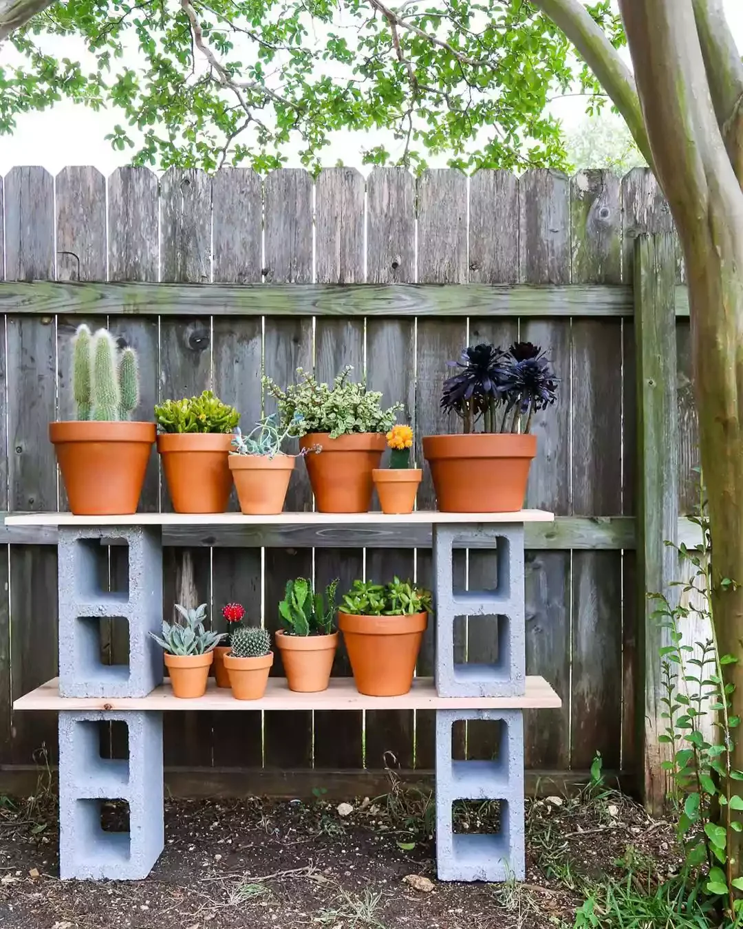 15 Budget-Friendly Cinder Block Garden Projects to Transform Your Outdoor Space 12 Create a Potting Table