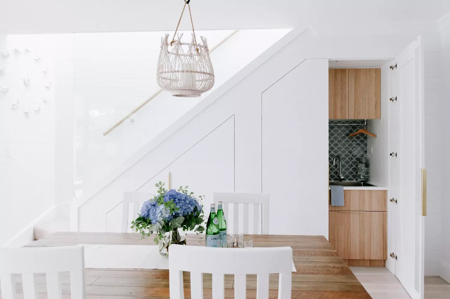 27 Clever Under-Stair Storage Solutions That Transform Wasted Space Create a Stealth Laundry