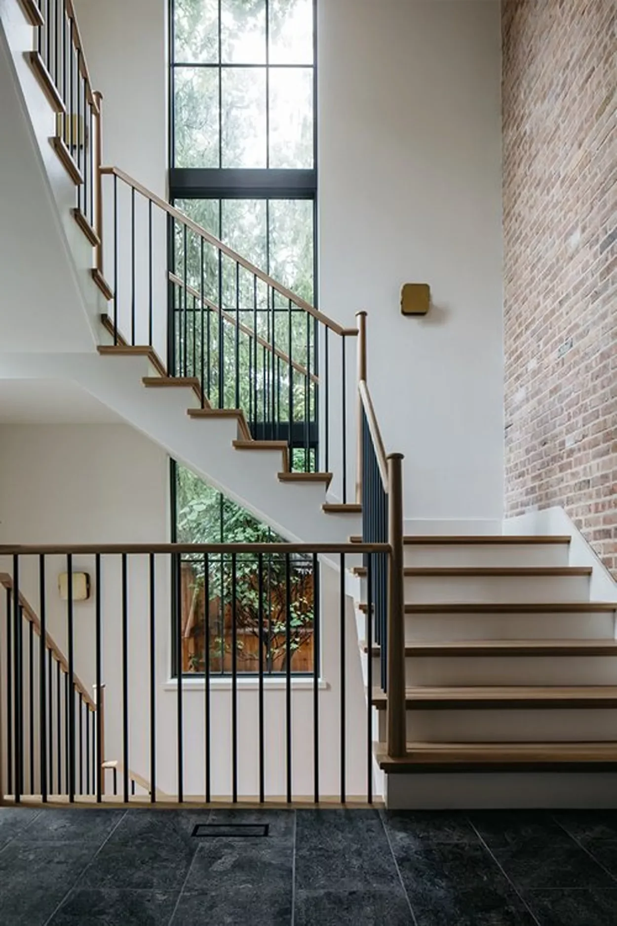 32 Staircase Design Ideas That Transformed Homes This Year Create an Accent Wall