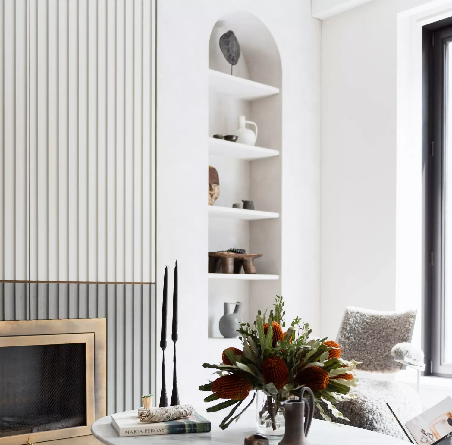 20 Beautiful Living Room Shelving Ideas to Transform Your Space 12 Create an Arched Alcove