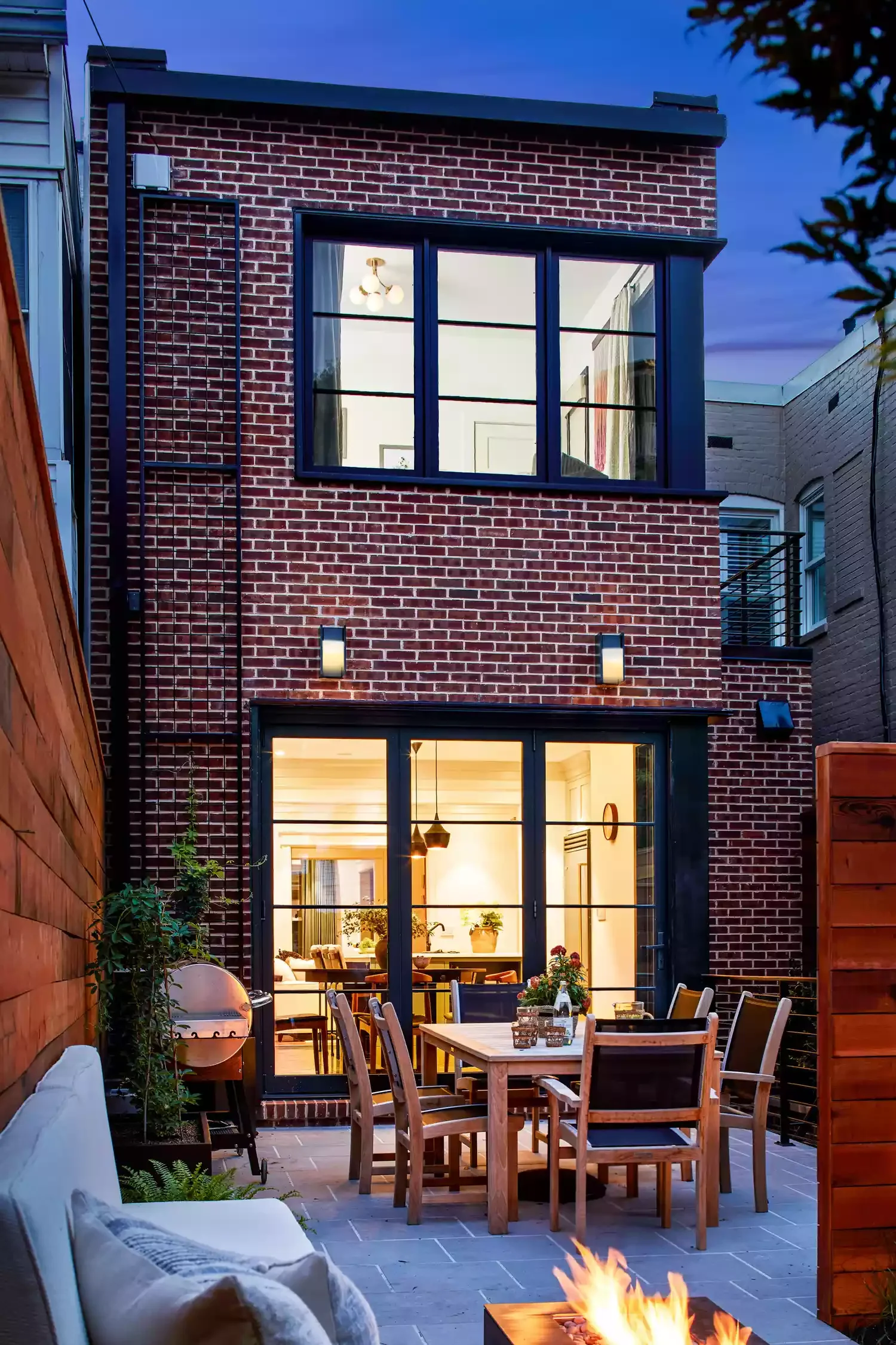 20 Stunning Grass-Free Backyard Designs That Create Lush Outdoor Retreats 10 Create the Perfect Patio With These Essential Pieces