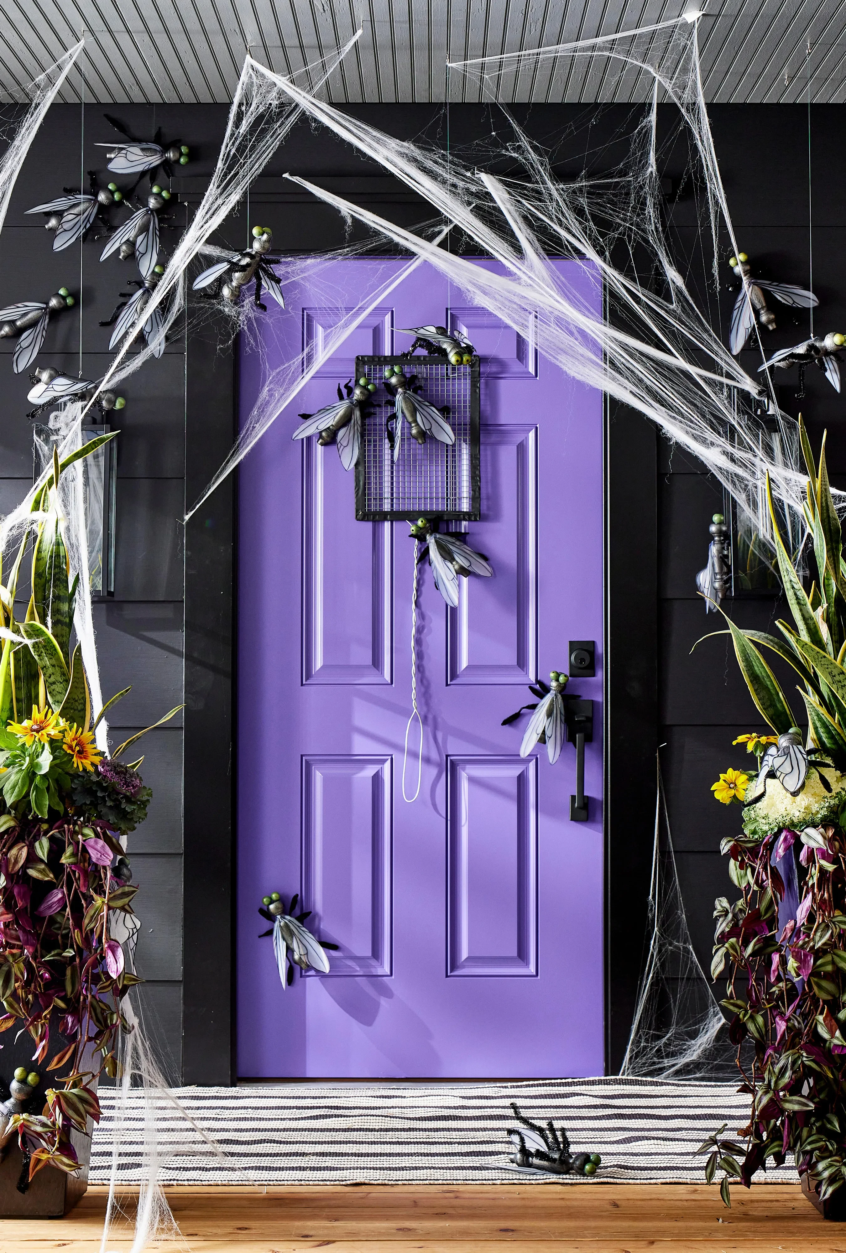 56 Creative DIY Halloween Decorations for Outdoor Spaces 14 Creepy Crawly Front Door Decor