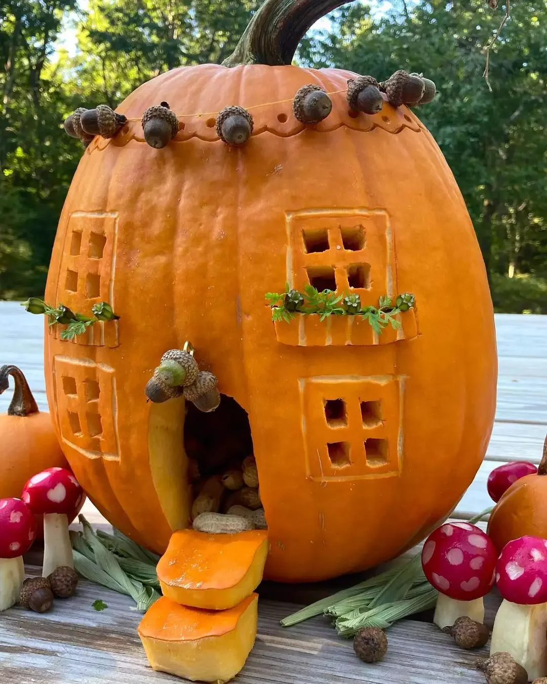 77 Creative Pumpkin Carving Ideas That'll Transform Your Fall Decorating Game 29 Critter House Pumpkin