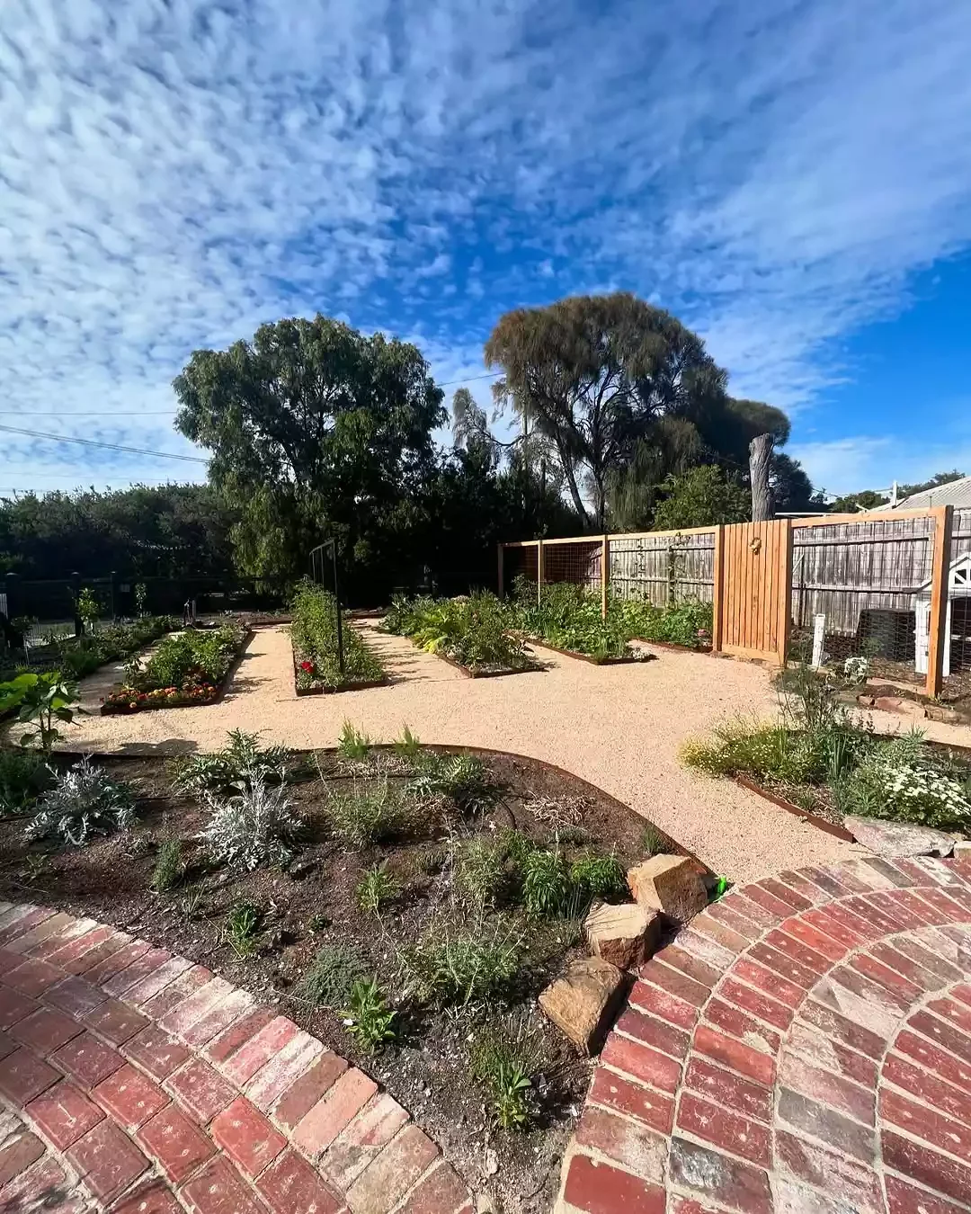 15 Beautiful Brick Border Ideas to Frame Your Garden Beds on Any Budget Curved Brick Pathway