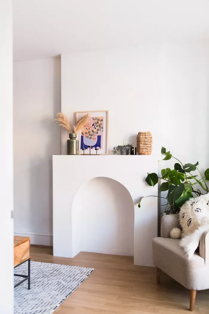 20 Creative DIY Fake Fireplace Projects You Can Build This Weekend 7 Curved Mantel Made from Plasterboard