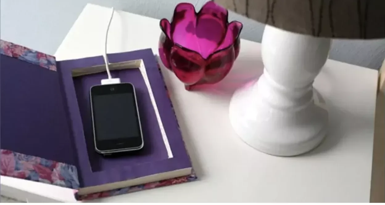 12 Smart Charging Station Solutions to Banish Cable Chaos Cut Into an Old Book