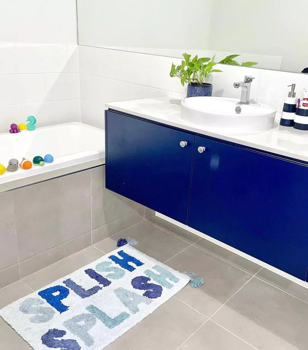 30 Delightful Kid-Friendly Bathroom Ideas That Evolve With Your Children 9 Cute Bath Mats