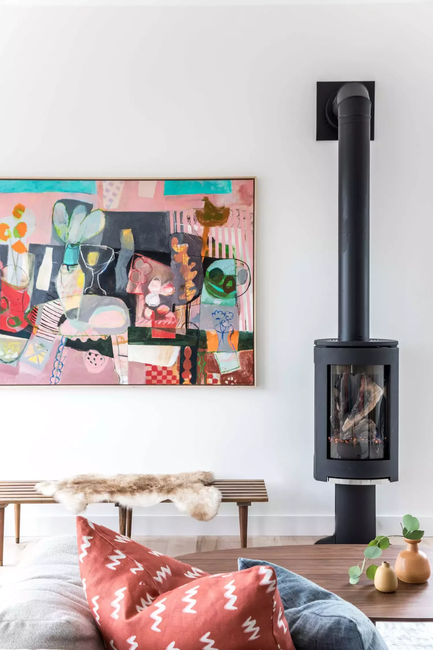 35 Bold Black Fireplace Designs That Transform Any Room Into a Stunning Showcase 19 Cylindrical Black Fireplace