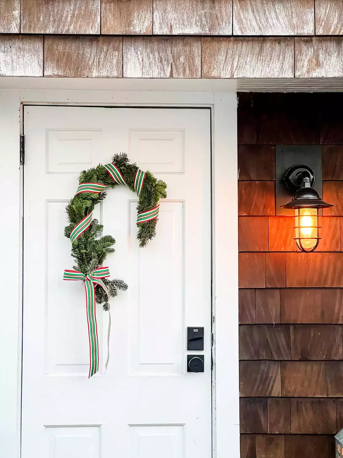 30 Christmas Door Decorating Ideas That Create Masterpieces DIY Candy Cane Wreath