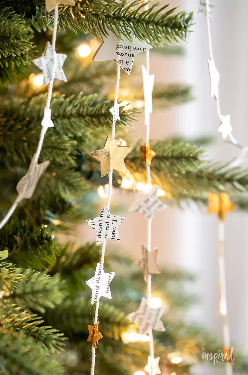 61 Stunning DIY Christmas Garland Ideas to Transform Your Holiday Decor 35 DIY Paper Star Garland
