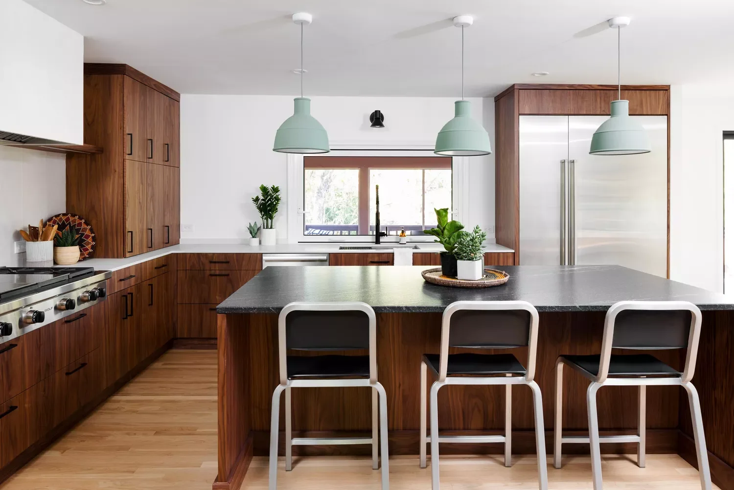 Dark Wood Cabinetry With White Walls
